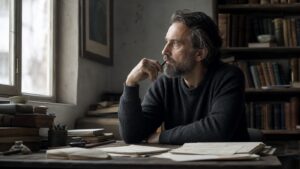 A philosopher studies in a quiet room, symbolizing Michael Oakeshott and skeptical political reflection.